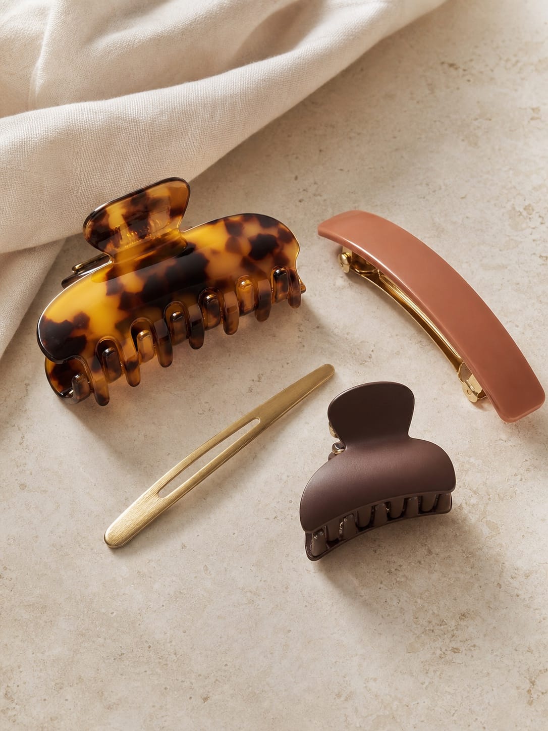 Hair clips and claws in acetate and metal